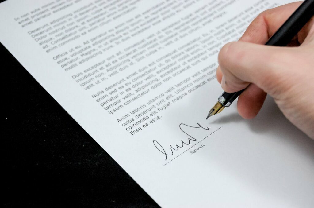 Signing property sale paperwork